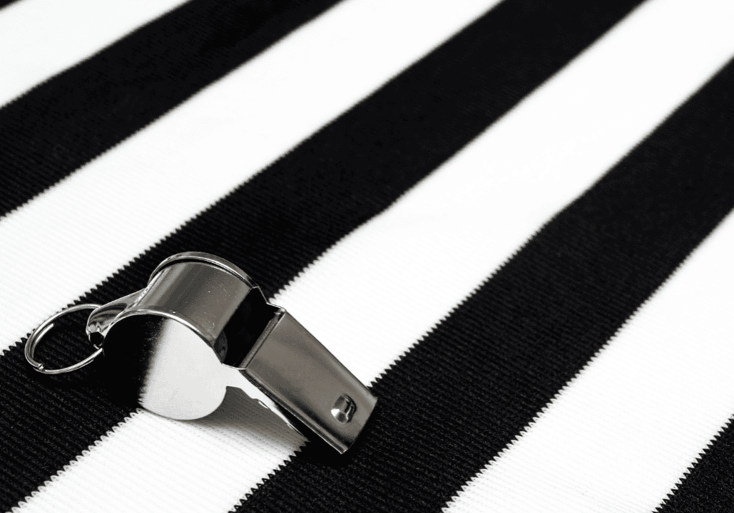 Black and white stripes and a whistle.